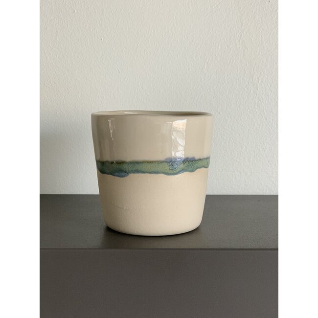 LS-design Ceramic handmade espresso cup of beige cast clay with a green and blue edge