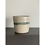 LS-design Ceramic handmade espresso cup of beige cast clay with a green and blue edge