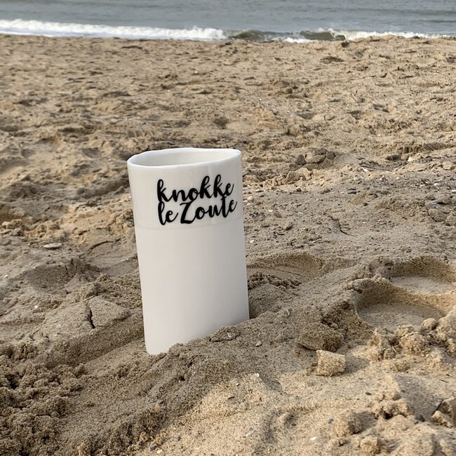 "Knokke Le Zoute" speak for themselves in a unique porcelain vase in cylinder form
