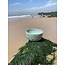 artisann With the turntable handmade bowl of Puerite clay with a beautiful Floating green high-firing glaze.