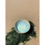 artisann With the turntable handmade bowl of Puerite clay with a beautiful Floating green high-firing glaze.