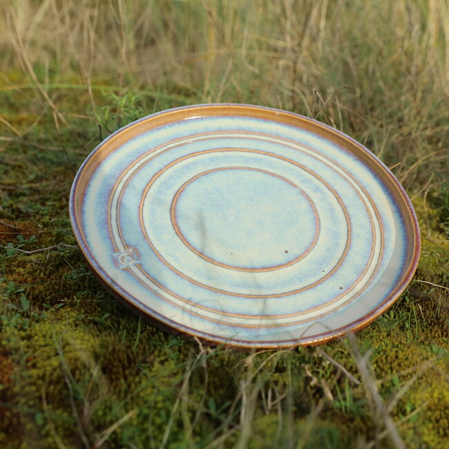 Handmade unique ceramic large plate for main course, cheese, presentation in a sunrise glaze finished