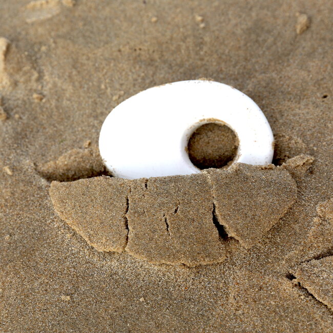 Unique handmade contemporary ceramic egg cup in porcelain with a transparant glazes