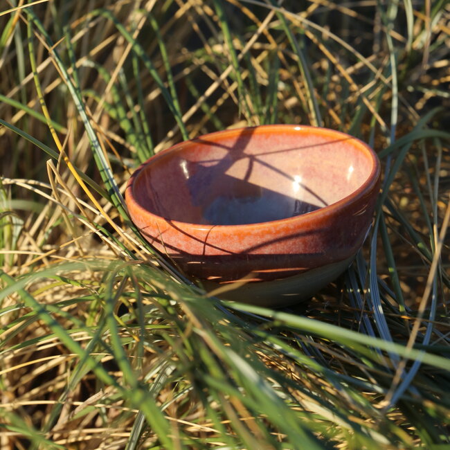 Handmade ceramic bowl with unique glazes from the "Sungreen" service