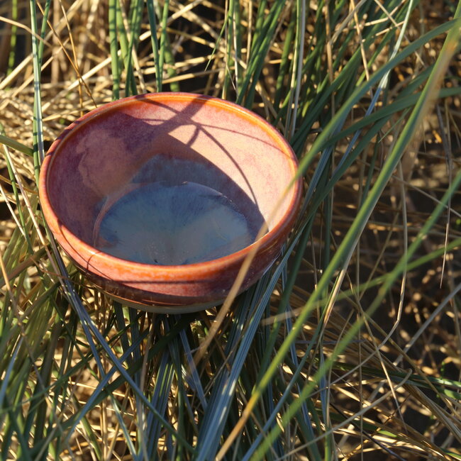 Handmade ceramic bowl with unique glazes from the "Sungreen" service