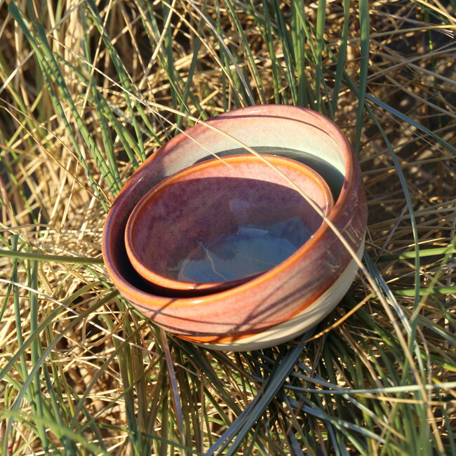 Handmade ceramic bowl with unique glazes from the "Sungreen" service