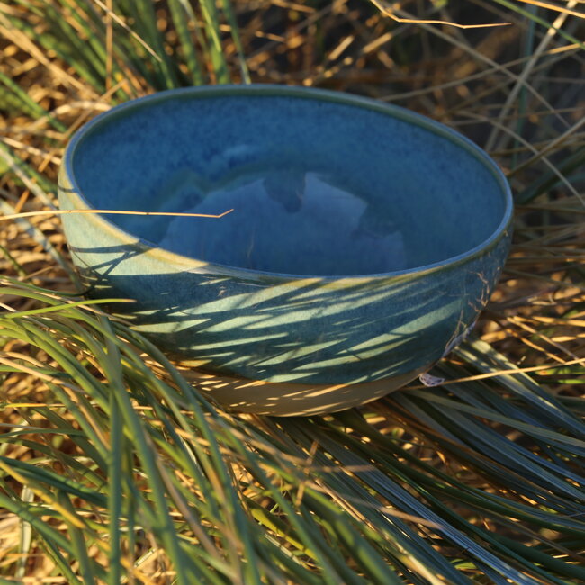 Handmade ceramic bowl with unique glazes from the "Mint" service