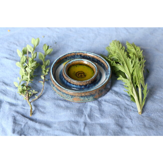 artisann Handmade small ceramic oil dish with the turntable in a beautiful blue glaze