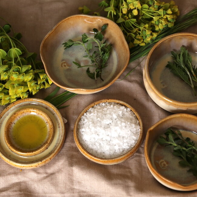 Handmade salt, pepper or tapas dish with the turntable, finished with my yellow high-firing glaze.