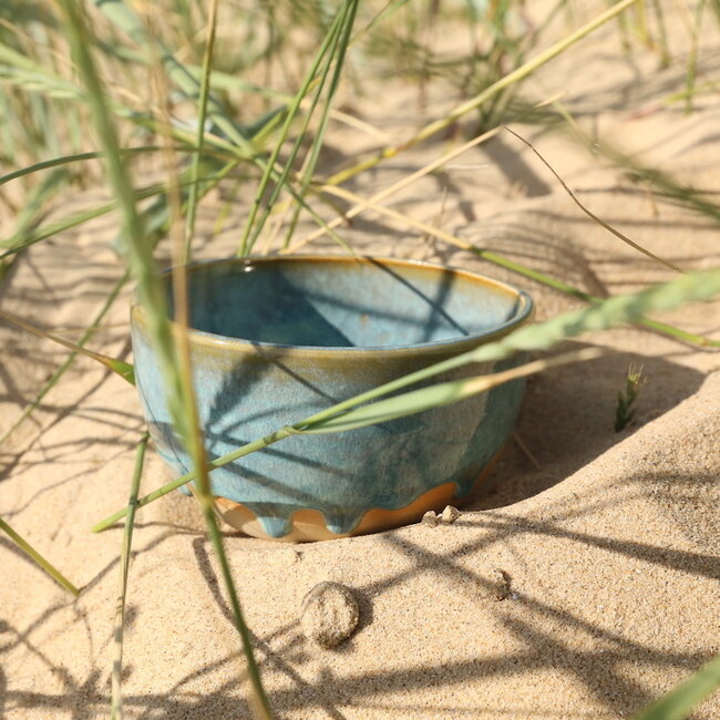 Handmade ceramic bowl with unique glazes from the "Mint" service