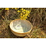 artisann With the turntable handmade bowl of Pyerite clay with a beautiful Floating yellow, musterd high-firing glaze.