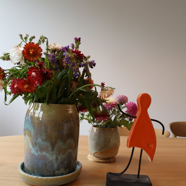 Kunst voorgesteld door een met de handgemaakt keramisch beeldje is het symbool voor eenheid, vriendschap, liefde, geluk, … en nog zoveel meer.