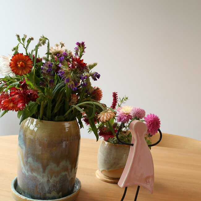 Art represented by a handmade ceramic statue is the symbol of unity, friendship, love, happiness, ... and so much more.