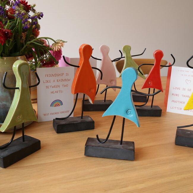 Art represented by a handmade ceramic statue is the symbol of unity, friendship, love, happiness, ... and so much more.