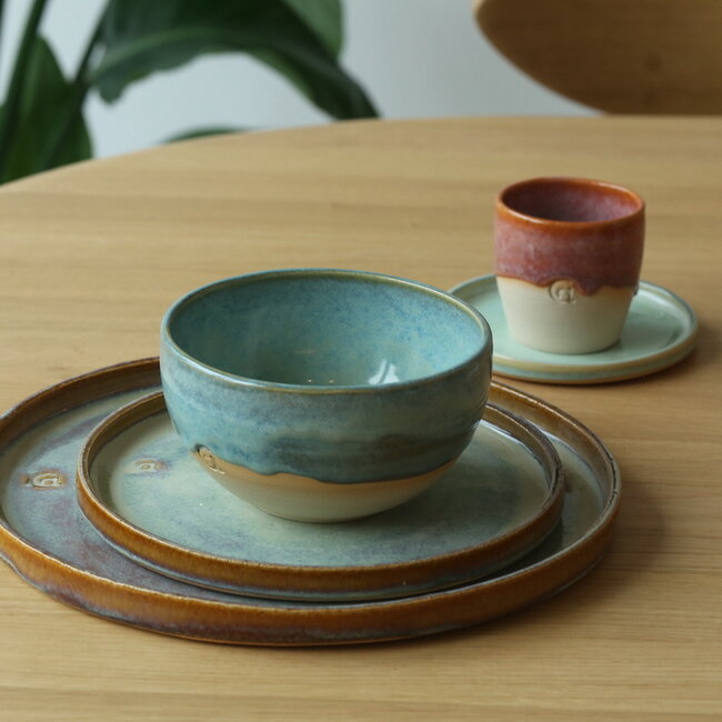 Handmade ceramic bowl with unique glazes from the "Mint" service