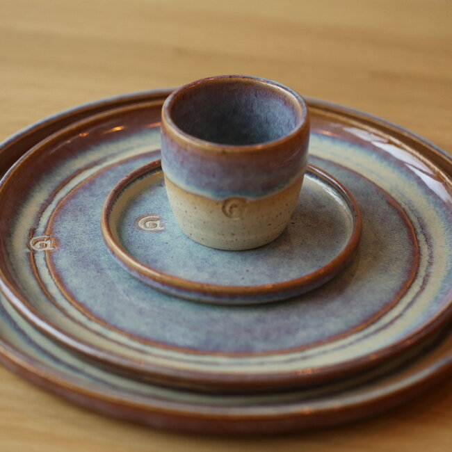 Handmade unique ceramic large plate for main course, cheese, presentation in a sunrise glaze finished