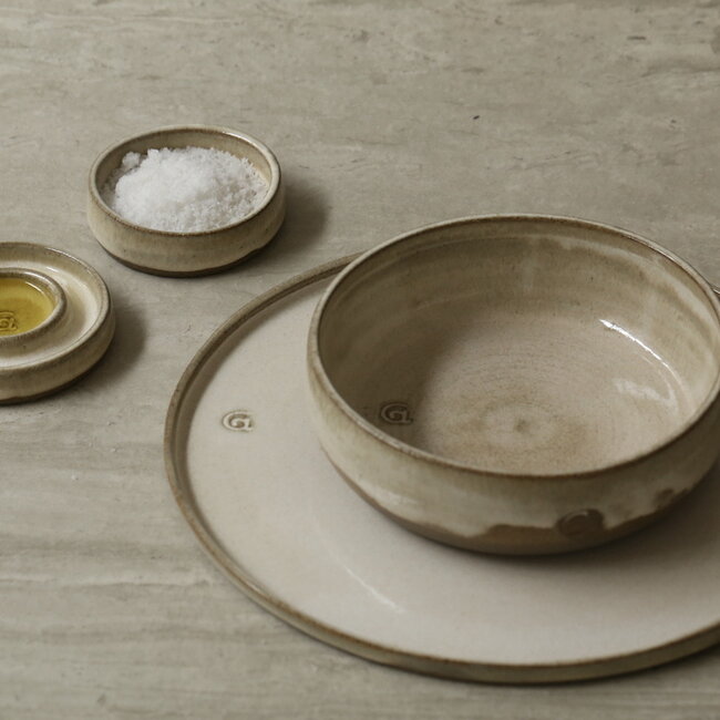 Het keramisch handgemaakt zout-, peper of tapas schaaltje van de collectie "Italian White"