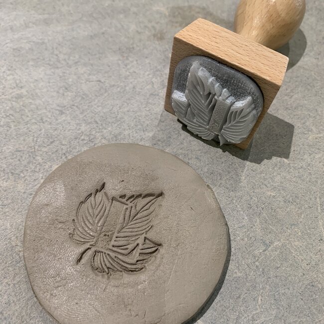 Handmade ceramic plate with logo