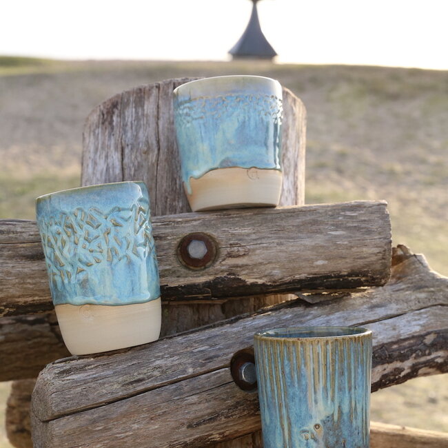 Unicum - A ceramic handmade mint vase or spoon pot finished with the carving technique