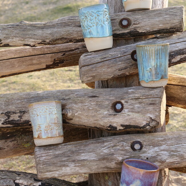 Unicum - A ceramic handmade Sunrise vase or spoon pot finished with the carving technique