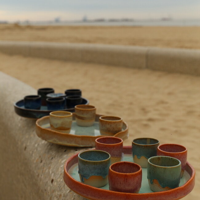 Unique, exclusive large Sungreen scale with a straight edge and hand-formed finish.