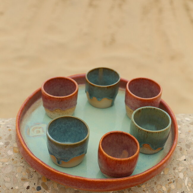 Unique, exclusive large Sungreen scale with a straight edge and hand-formed finish.