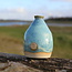 A ceramic handmade vase for one flower, twig... or simply as decoration
