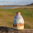 A ceramic handmade vase for one flower, twig... or simply as decoration