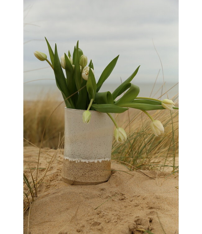 artisann A ceramic handmade white vase with elegant artistic shapes