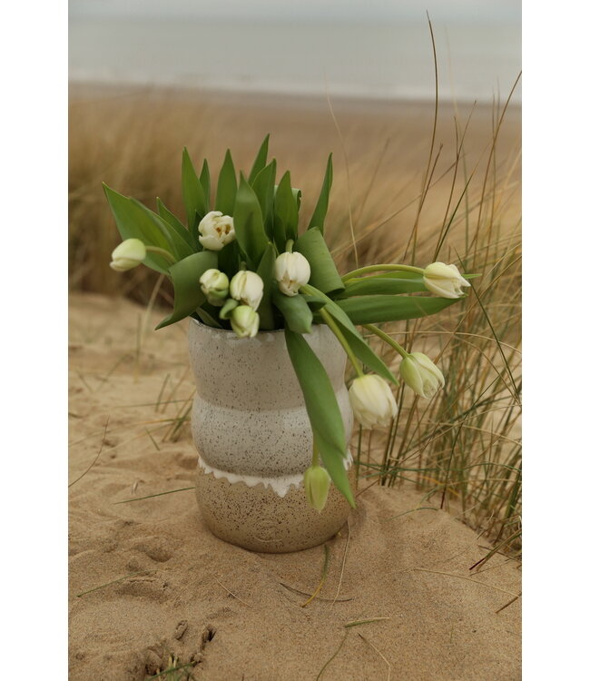 artisann A ceramic handmade white vase with elegant artistic shapes round