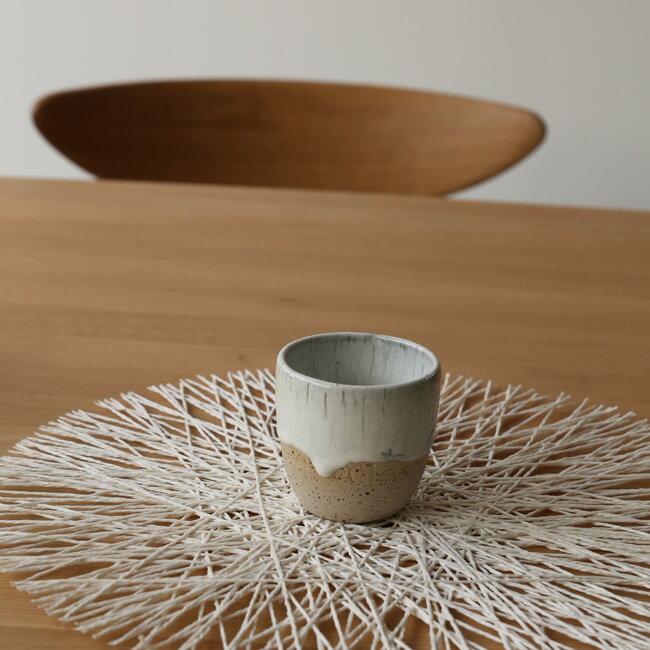 Contemporary, handmade ceramic cup from the tableware and collection “White Spots"