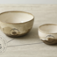 Handmade ceramic bowl with stamp