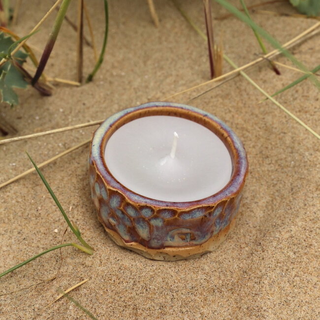 Handmade ceramic tealightholder, Sunrise carving