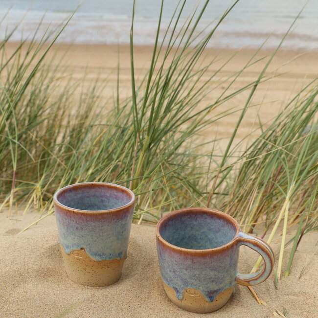 Contemporary, handmade ceramic mug from the tableware and collection “Sunrise"