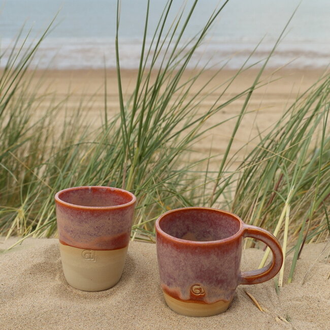 Contemporary, handmade ceramic thea or water cup from the tableware and collection “Sungreen"