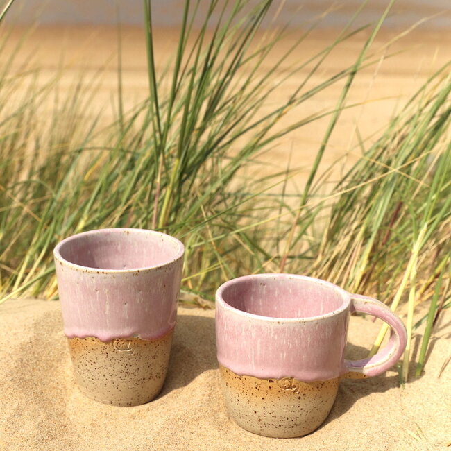 Contemporary, handmade ceramic thea or water cup from the tableware and collection “Pink"