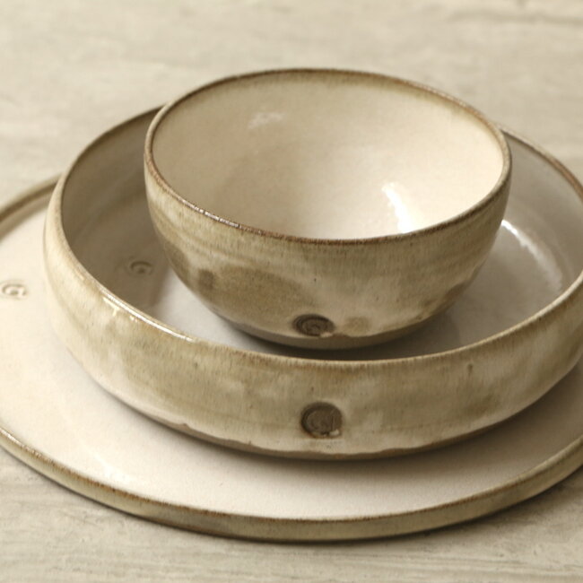 Handmade ceramic bowl with unique glazes from the "Italian White" service