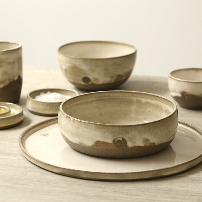 Handmade ceramic bowl with unique glazes from the "Italian White" service