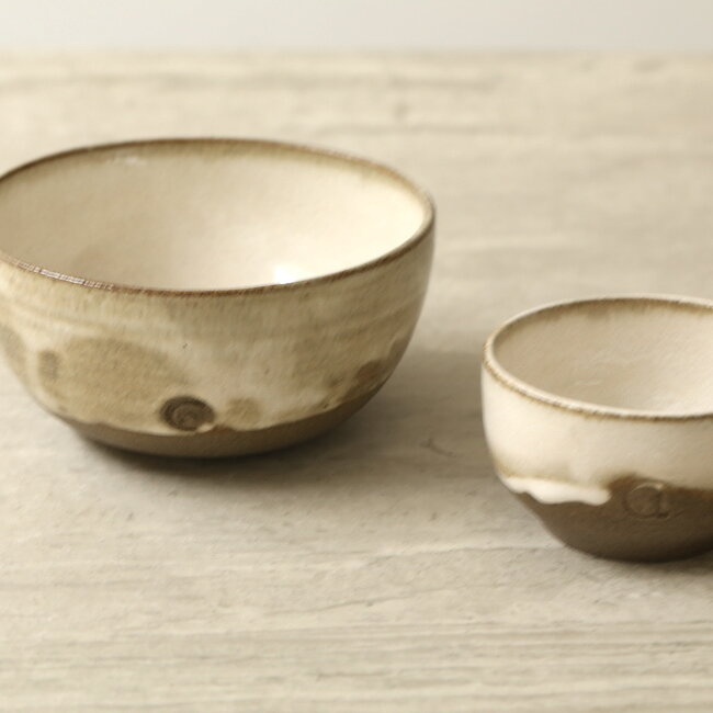 Handmade ceramic bowl with unique glazes from the "Italian White" service