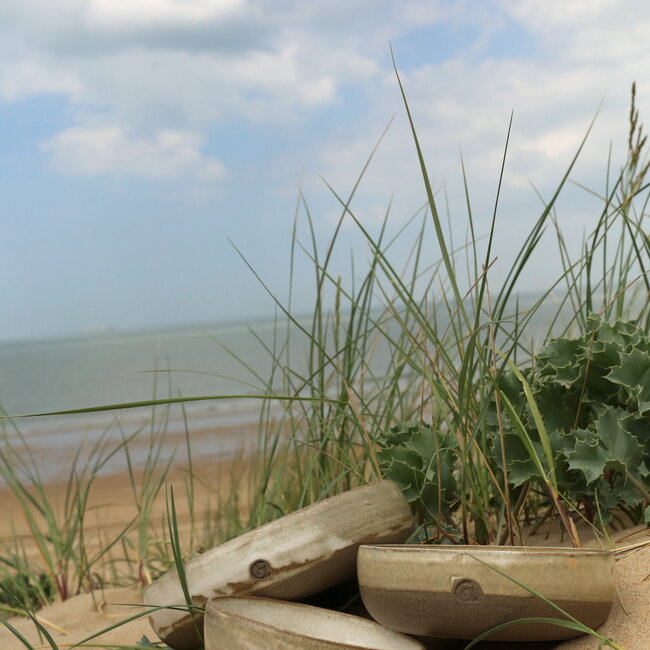 Handmade ceramic scale with unique glazes from the "Italian White" service