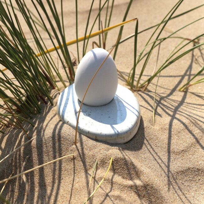 Unique handmade contemporary ceramic egg cup  glazes in the color white