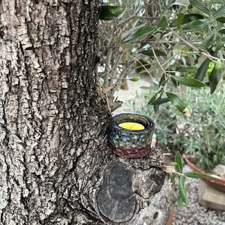 artisanni Ceramic tealight holder Beach carving