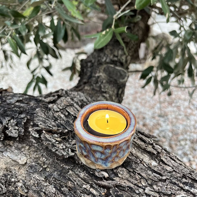 Handmade ceramic tealightholder, Sunrise carving