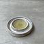 Handmade small ceramic oil dish with the turntable in a beautiful white glaze