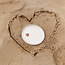 Wit handgemaakt keramisch bord van het servies en de collectie “White Heart" met een sungreen-kleurig hart