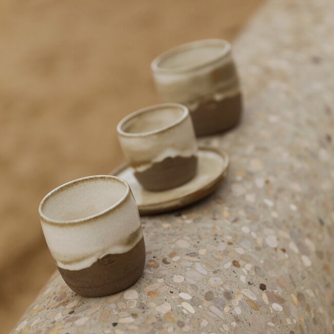 Contemporary, handmade ceramic cup from the tableware and collection “Italian White"