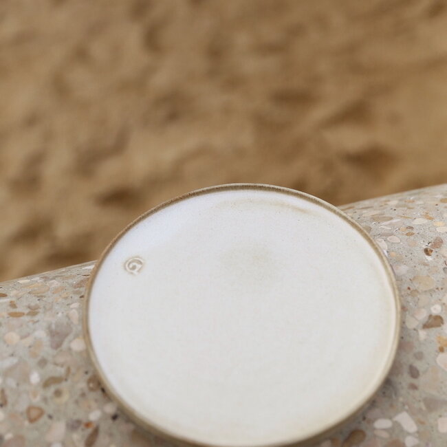 Handmade white and black ceramic plate from the tableware and collection “Italian White"