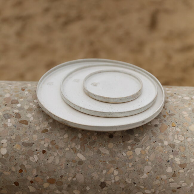 Handmade white ceramic plate from the tableware and collection “White Spots"