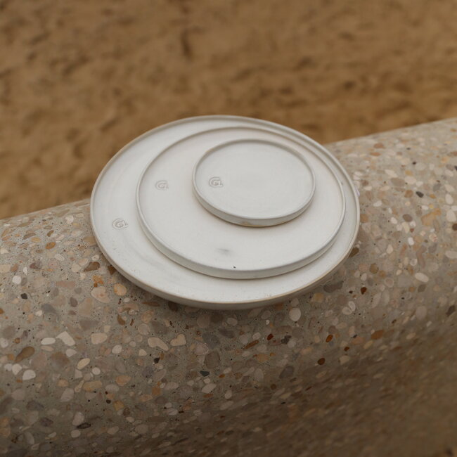 Handmade white ceramic plate from the tableware and collection “White Dunes"