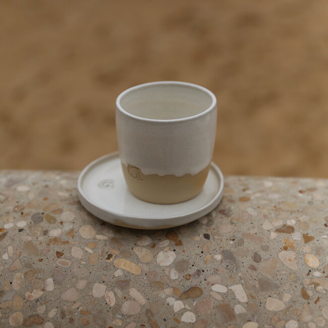 Handmade white ceramic plate from the tableware and collection “White Dunes"